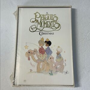 New and Sealed 1988 A Precious Moments Christmas Book by Sam Butcher